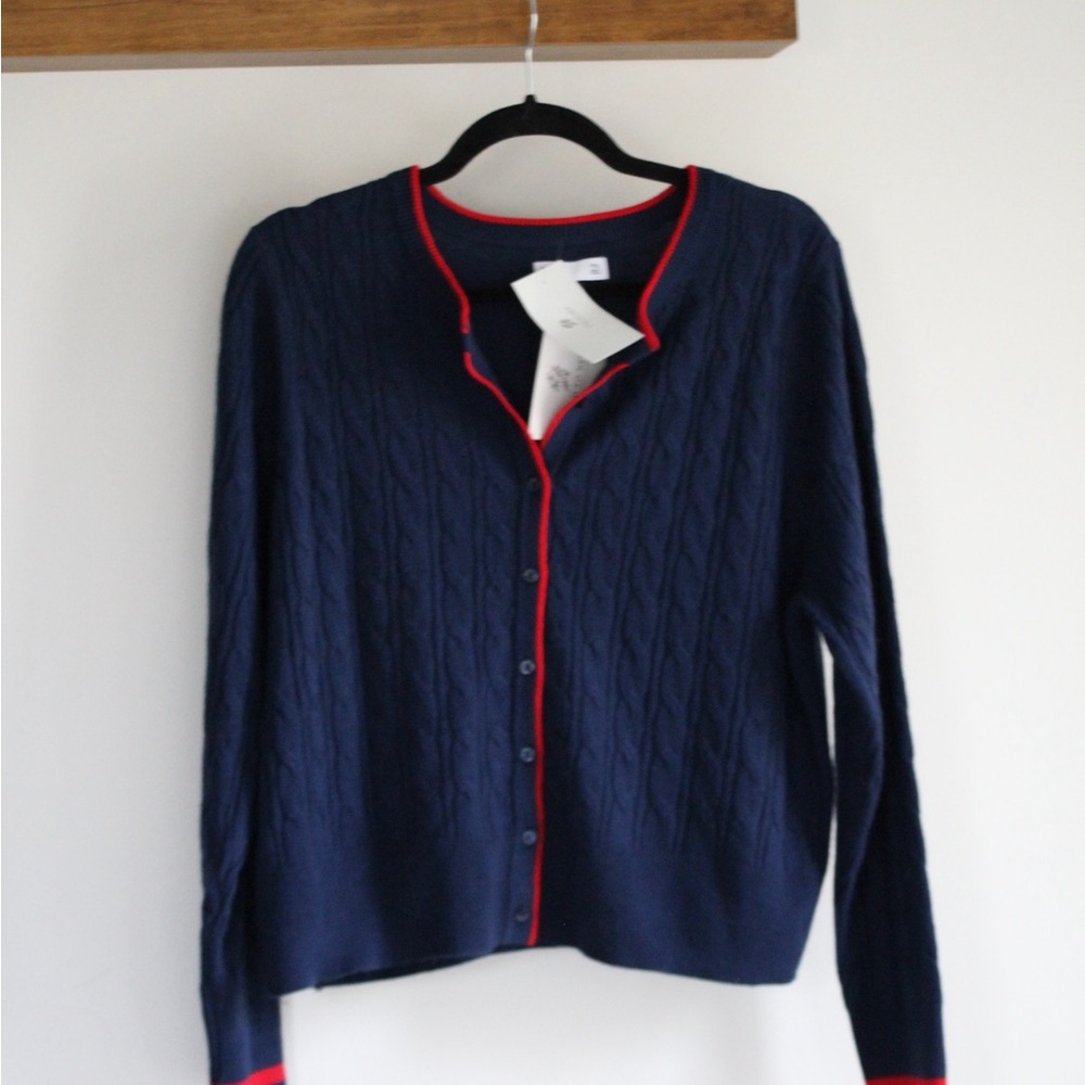Navy blue cardigan with red edge detail
